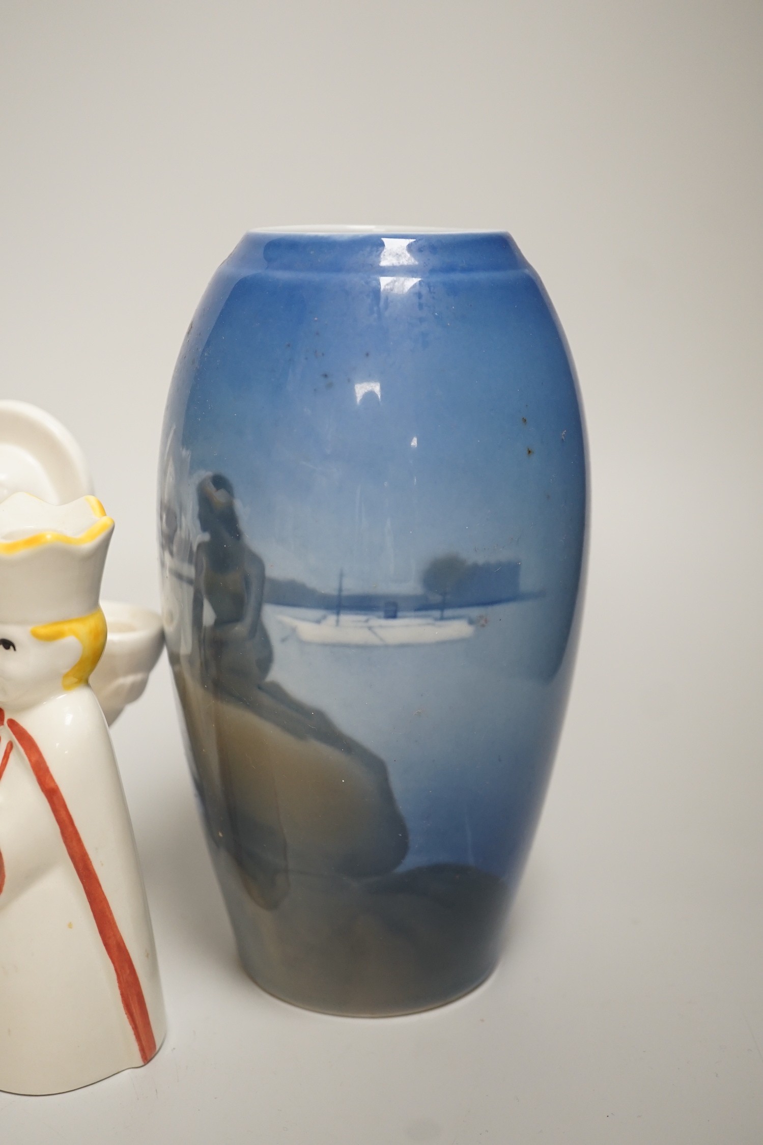 A group of Royal Copenhagen porcelain figural candle holders, a vase, the figure of a polar bear cub and a Mother’s Day dish